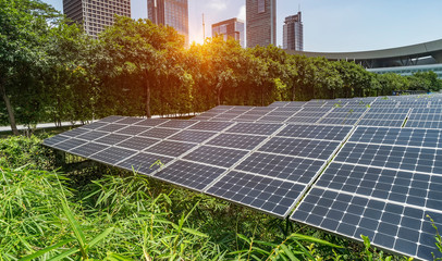 solar panel plant with urban landscape landmarks,Ecological energy renewable concept.