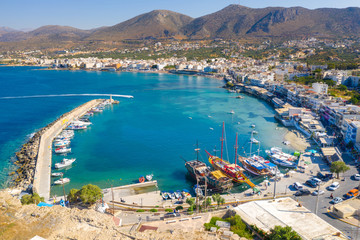 Aerial view of the harbor of the famous resort Chersonissos, Crete, Greece - obrazy, fototapety, plakaty