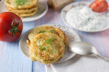 Pancakes from zucchini. Vegetarian vegetable patties or pancakes.