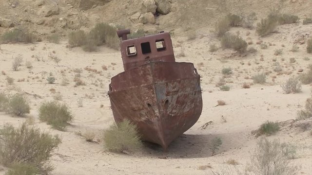 Uzbekistan The bottom of the retreating Aral Sea. Cemetery ships.