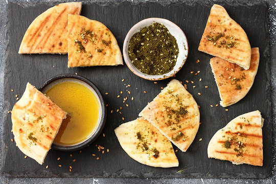 Pita bread sandwiches and grilled with olive oil and zatar.Top view