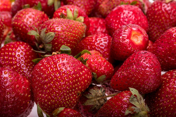 Close up of fresh ripe strawberries fruits