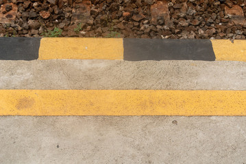 Fototapeta premium black and yellow line on the floor
