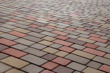 Fototapeta premium Photo of multi-colored paving stones pattern and background