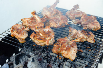 Chicken pieces are grilled. Mediterranean Kitchen