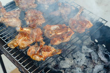 Chicken pieces are grilled. Mediterranean Kitchen