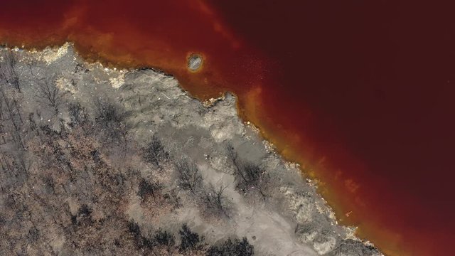 Red acid mine drainage from above 4K aerial footage