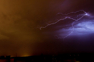 Lightning on the sky during summer storm 