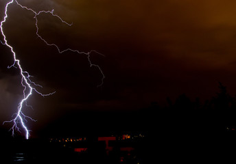 Lightning on the sky during summer storm 