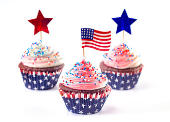 American Themed Cupcakes with Sprinkles and Decorations on a White Background