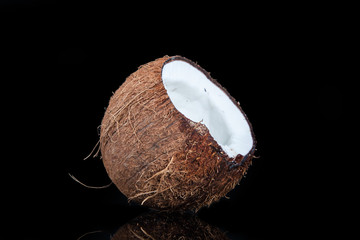 tropical coconut on a black background