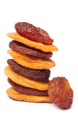 Stack of dried red plums and apricots