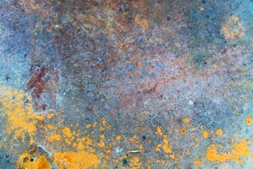 Abstract pattern of rust stains on an iron sheet as a base background.