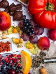 antioxidants, resveratrol food as green tea, grape, blueberry, apricot, apple, cocoa, tomatoes, pomegranate, physalis, dark chocolate, goji, nuts