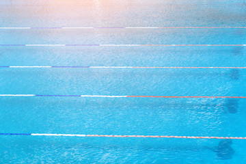 Swimming paths in the sports pool with water.