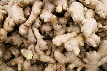 Ginger close-up on the counter in the grocery store. Useful food for health.