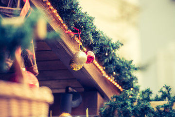 Magical Christmas market: Decoration with Christmas bauble on a fir branch.