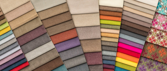 colorful background from colored upholstery fabric samples