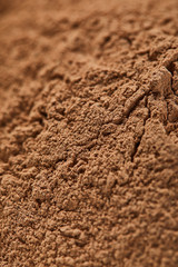 close up view of brown textured clay powder