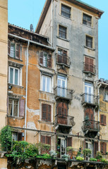 Old urban flaky house in Verona