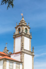 Viseu / Portugal - 04 16 2019 : View of a tower at the Church of Mercy, baroque style monument, architectural icon of the city of Viseu, in Portugal