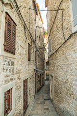Narrow street and old houses in the old town in Split, Croatia