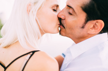 Beautiful loving couple outdoor activity. Italian man with his caucasian girlfriend emotional...