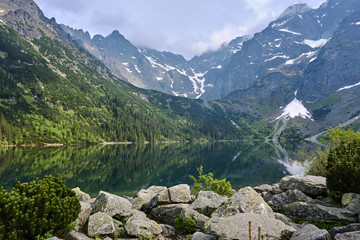 Boulders on the shore of Lake Morskie Oko in the Tatra Mountains in Poland... © GKor