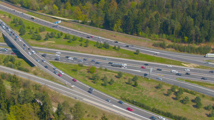 AERIAL: Countless vehicles drive up and down the busy highway network in summer.