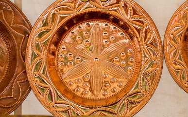 Plate, Hand-designed copper utensils for working in the kitchen, dishes, pots, pans and cauldrons