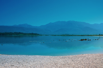 Fototapeta na wymiar view of the mountains in montenegro coastal sea with blue sky