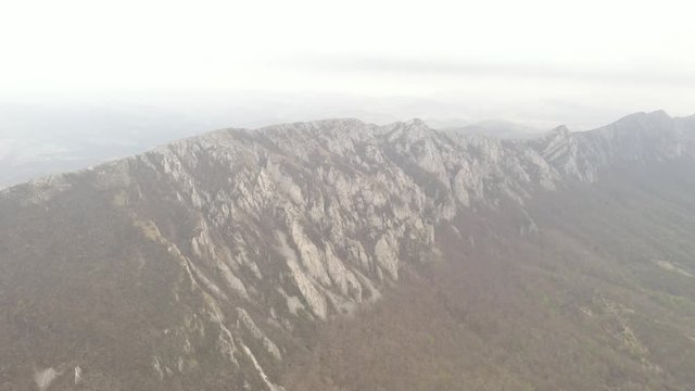 Misty morning over the ridge of Veliki Krsh mountain 4K drone video