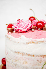 cake with cream and cherries