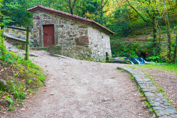 Fototapeta na wymiar Old restored water mill