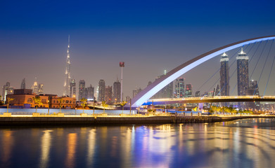 Fototapeta na wymiar Dubai city skyline at night. view of Tolerance bridge