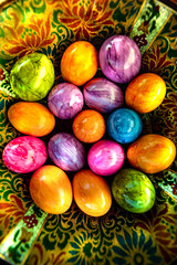 colorful easter eggs in a beautiful bowl