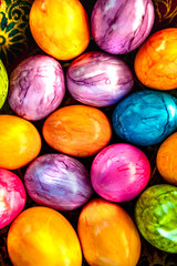 colorful easter eggs in a beautiful bowl