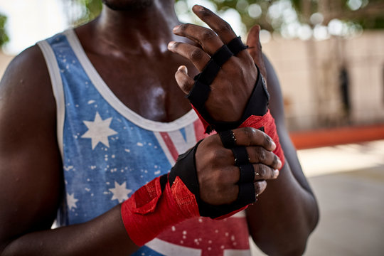 Close-up of boxer applying bandages