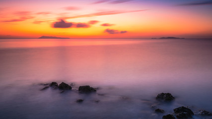 Fototapeta na wymiar Scenic view of the sea during a colorful sunset. Mediterranean Sea, Corfu, Greece
