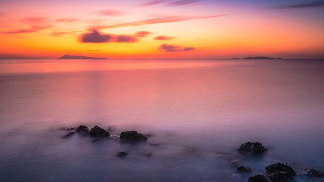 Scenic view of the sea during a colorful sunset. Mediterranean Sea, Corfu, Greece