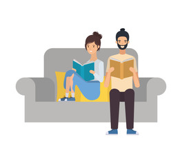 couple sitting on chair with book in hands
