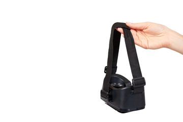 Hand with black plastic VR headset, Virtual Reality mask.
