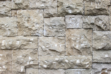 Textured wall of photo tiles for text