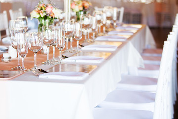 Brightly lit table at wedding reception