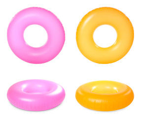 Set of bright inflatable rings on white background