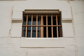 Obraz premium Window of prison cell with bars, close up