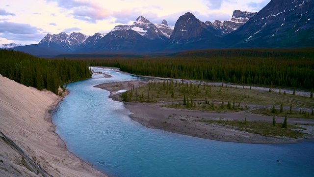 Beautiful sunset over the Mount Fryatt by the Athabasca River on the Icefields Parkway, Jasper National Park, Alberta, Canada