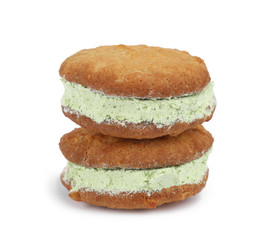 Fototapeta na wymiar Sweet delicious ice cream cookie sandwiches on white background