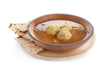 Bowl of Jewish matzoh balls soup isolated on white