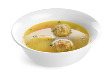 Bowl of Jewish matzoh balls soup isolated on white